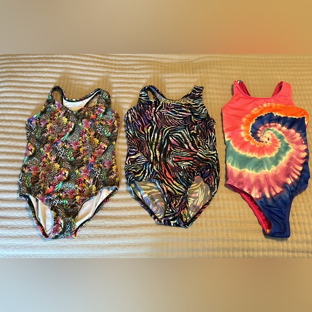 Girls Bathing suits . 2 Dori’s creations size 12/14 and one land’s end size 10